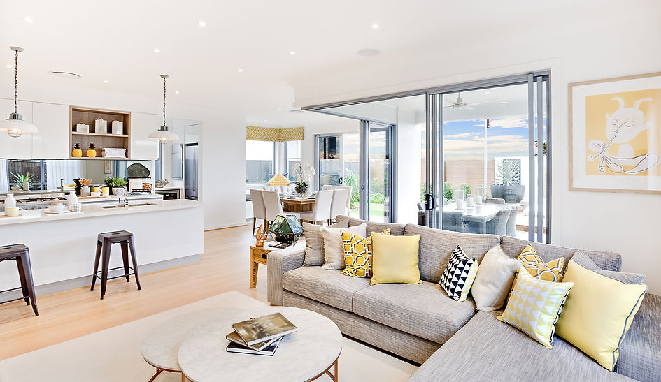 Photo of a residential home lounge room and kitchen