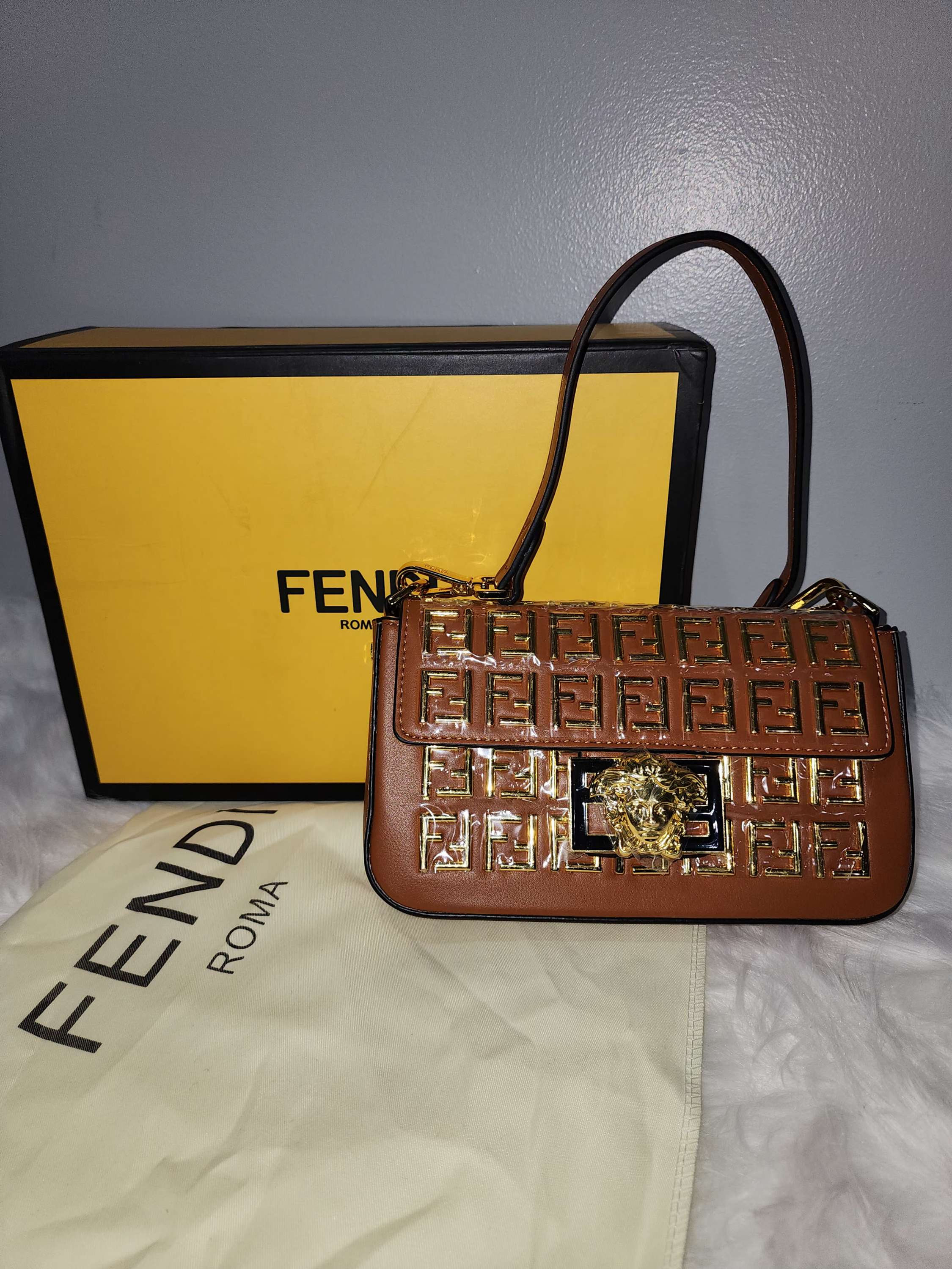 F3ndi & V3rs@c3 Genuine Leather Bag