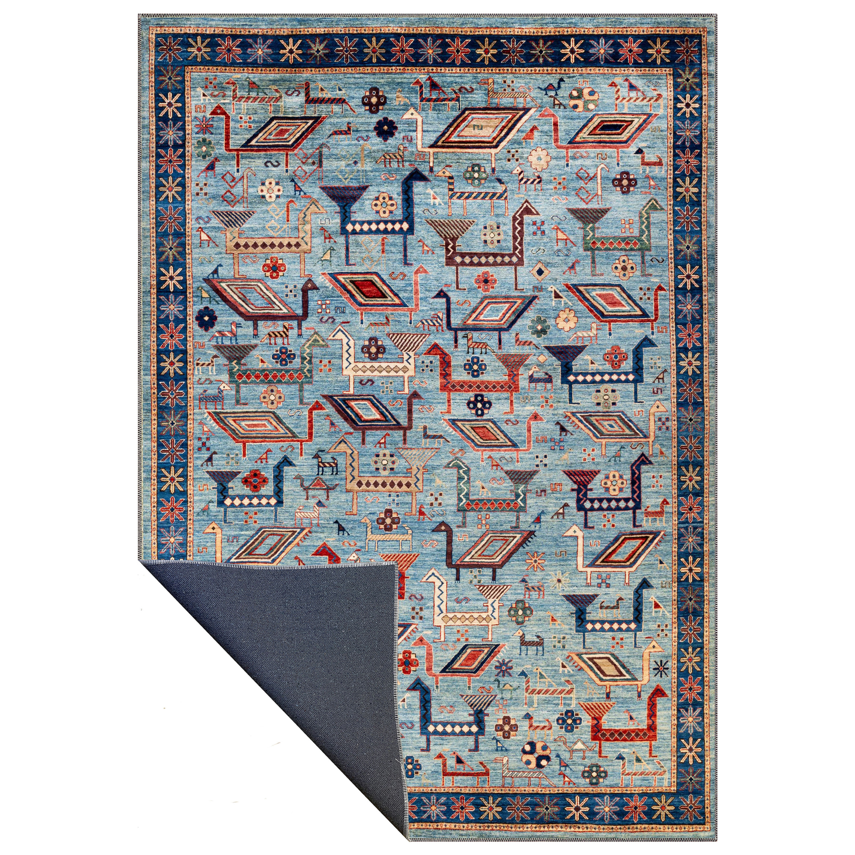 blue turkish animal motif washable rug turvexa in eclectic bohemian interior design
