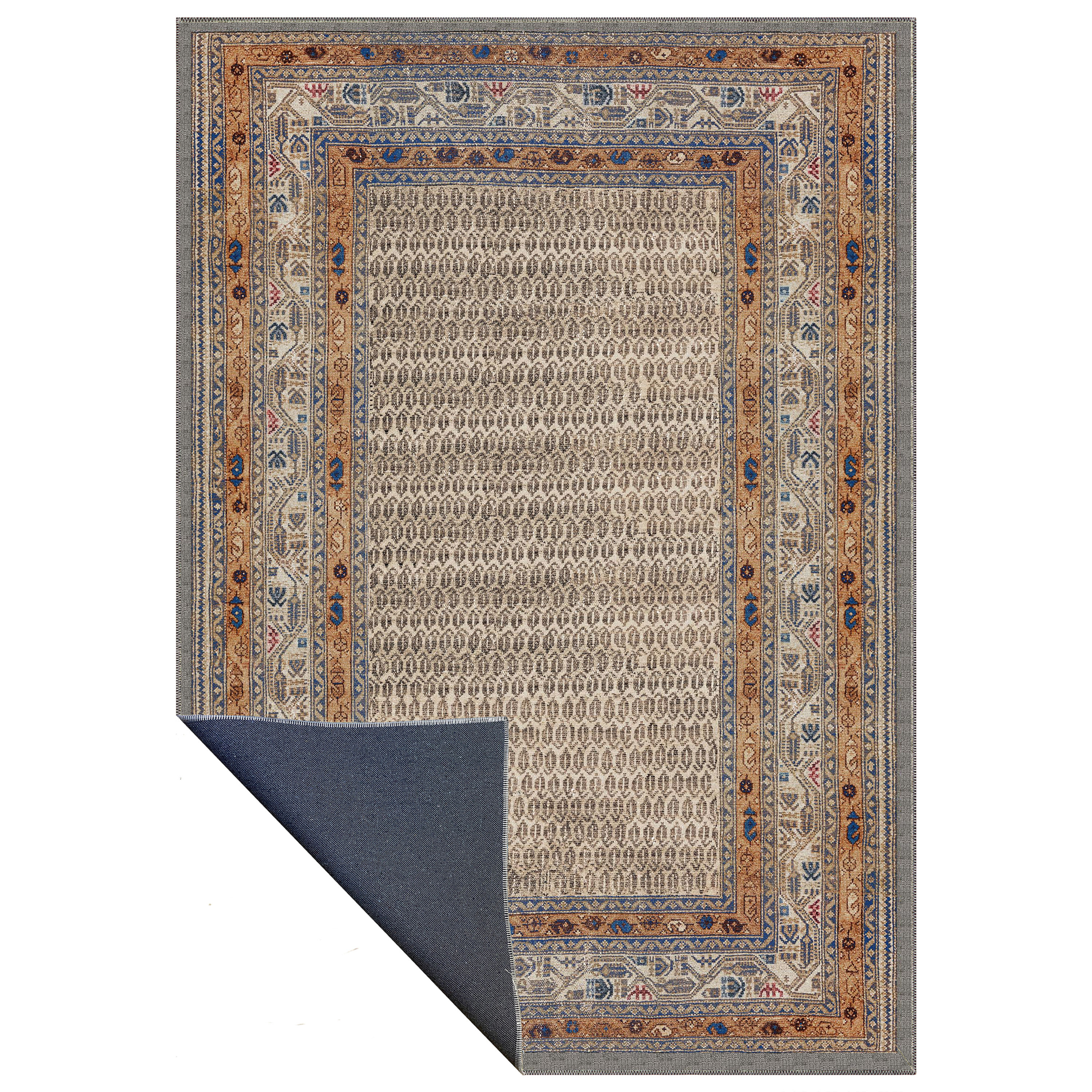 elaria rug close up showing bohemian pattern and distressed vintage texture
