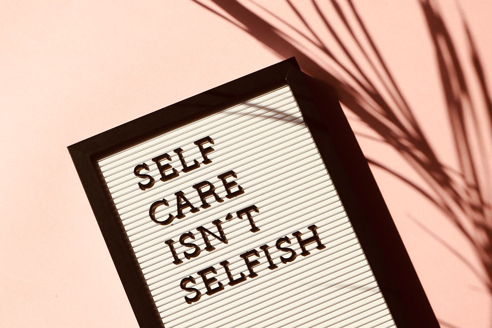 a framed quote that says self care isn't selfish