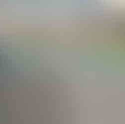 Covered patio with concrete deck finished in pavers