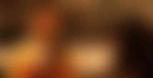 Angela Kim being interviewed while dressed in a traditional Hanbok.