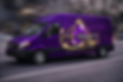 Purple mobile lab on city streets.png