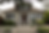"Front entrance of Alexandria Victoria Assisted Living, a historic Victorian residence in Santa Cruz with landscaped gardens and accessible entry railings."