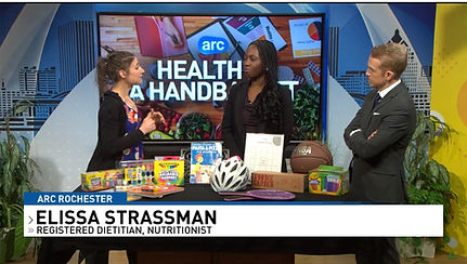 Elissa Strassman, RDN, CDN with Stephannie Joseph and Dan Schrack, of Fox Rochester WUHF, talking about Every Kid Healthy Week.
