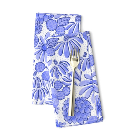 blue floral napkins with a fork