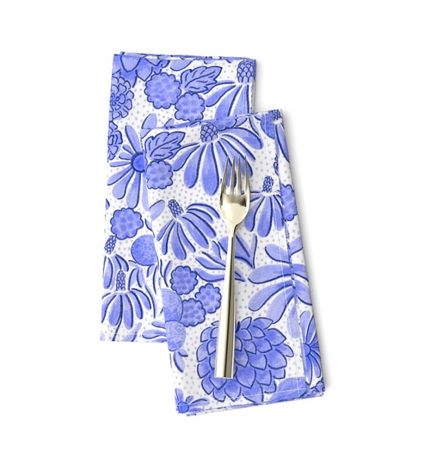 blue floral napkins with a fork