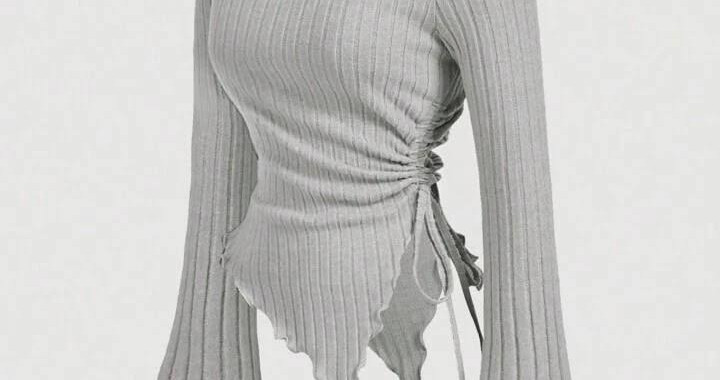 Yeni sezonun güçlü şehir stili: Gri tonlarda modern bir crop üst ve geniş paça pantolon kombinasyonu. Hem maskülen hem femme çizgilerin sofistike uyumu