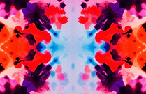 simple watercolor inkblot with soft warm colors (hues of purple and pink and orange and bl