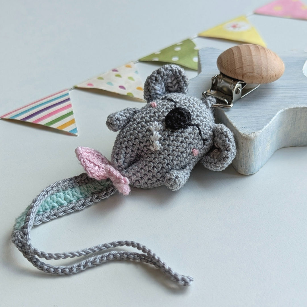 Handcrafted pacifier clip with Cozy Koala and leaf in soft pastel colors: gray, mint and lilac