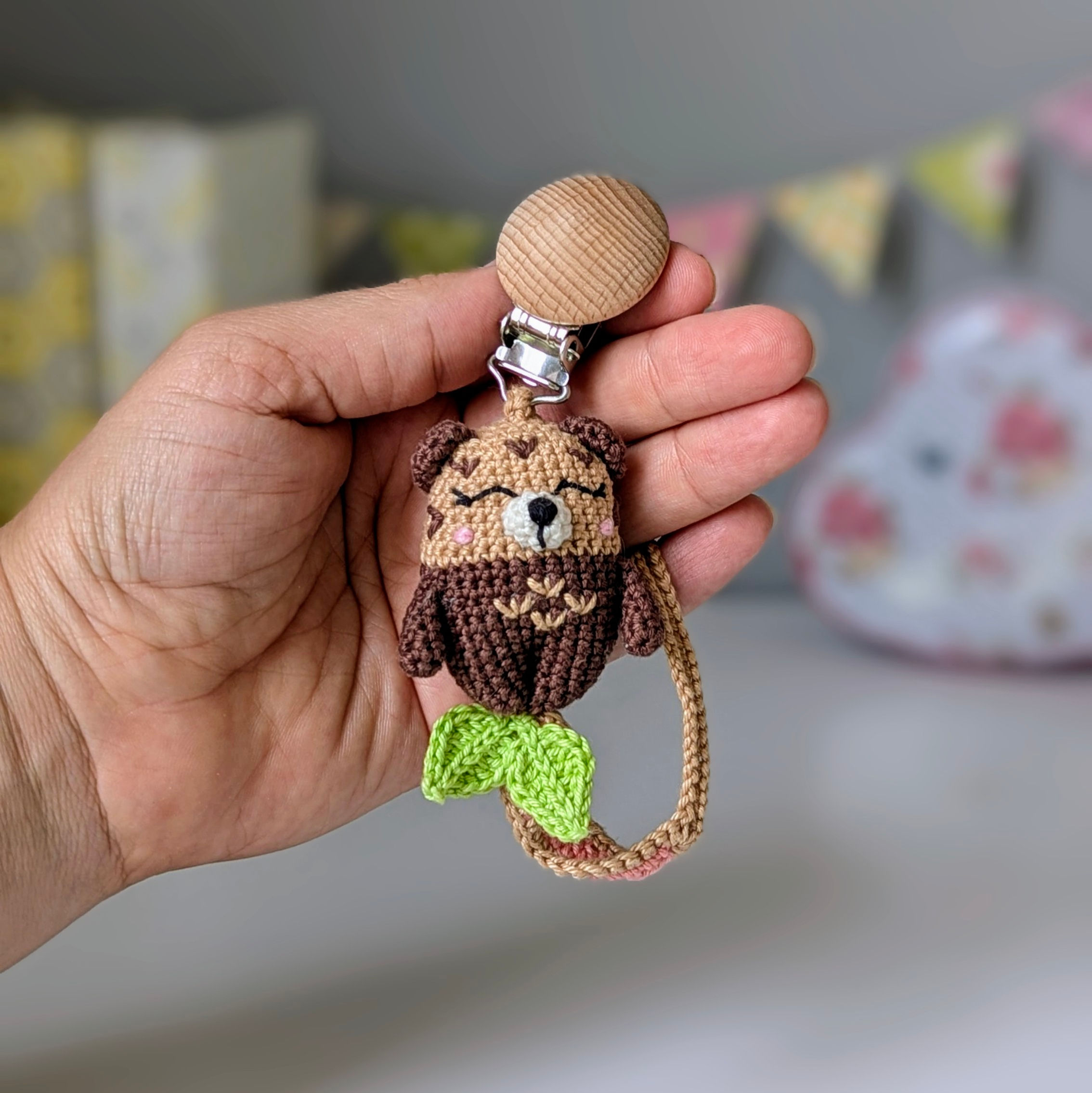 Handmade pacifier clip with soft crochet otter