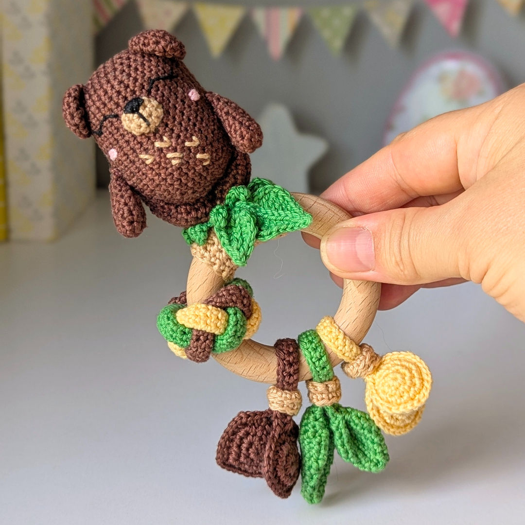 Handcrafted baby rattle with crochet bear