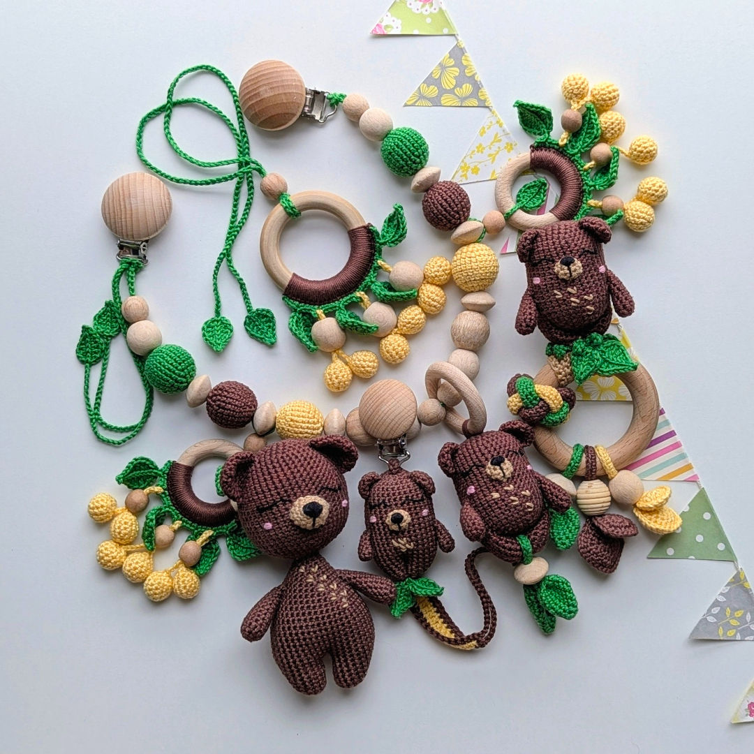 Handmade 5-piece bear baby gift set featuring a pacifier clip, rattle, soft toy, hanging toy, and stroller chain