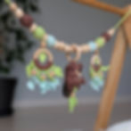 Stroller chain with beaver rattle and crocheted wooden ring, botanical motifs in brown-green colors