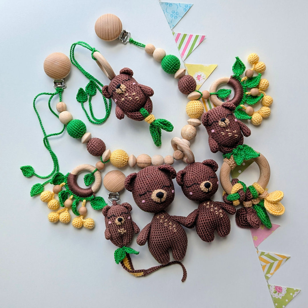 Handmade 5-piece bear baby gift set featuring a pacifier clip, rattle, soft toy, hanging toy, and stroller chain