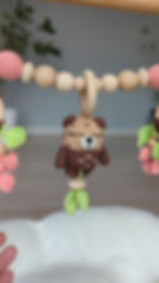 Thumbnail: Video of stroller chain with crochet otter rattle and leaf rings — shows movement, details, and textures in action