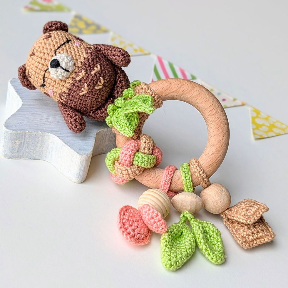 Thumbnail: Baby rattle with crochet otter