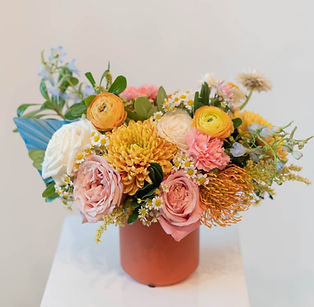 Custom floral arrangement featuring hand-selected premium blooms for delivery