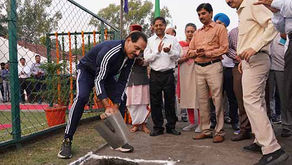 Chandigarh Adviser Dharam Pal lays stone for synthetic athletics track