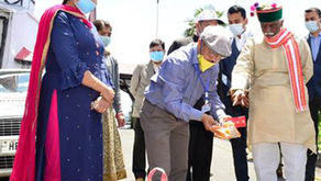 Governor Bandaru Dattatraya flagged-off pick-ups containing survival kits and hygiene kits for poor
