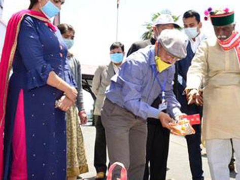 Governor Bandaru Dattatraya flagged-off pick-ups containing survival kits and hygiene kits for poor