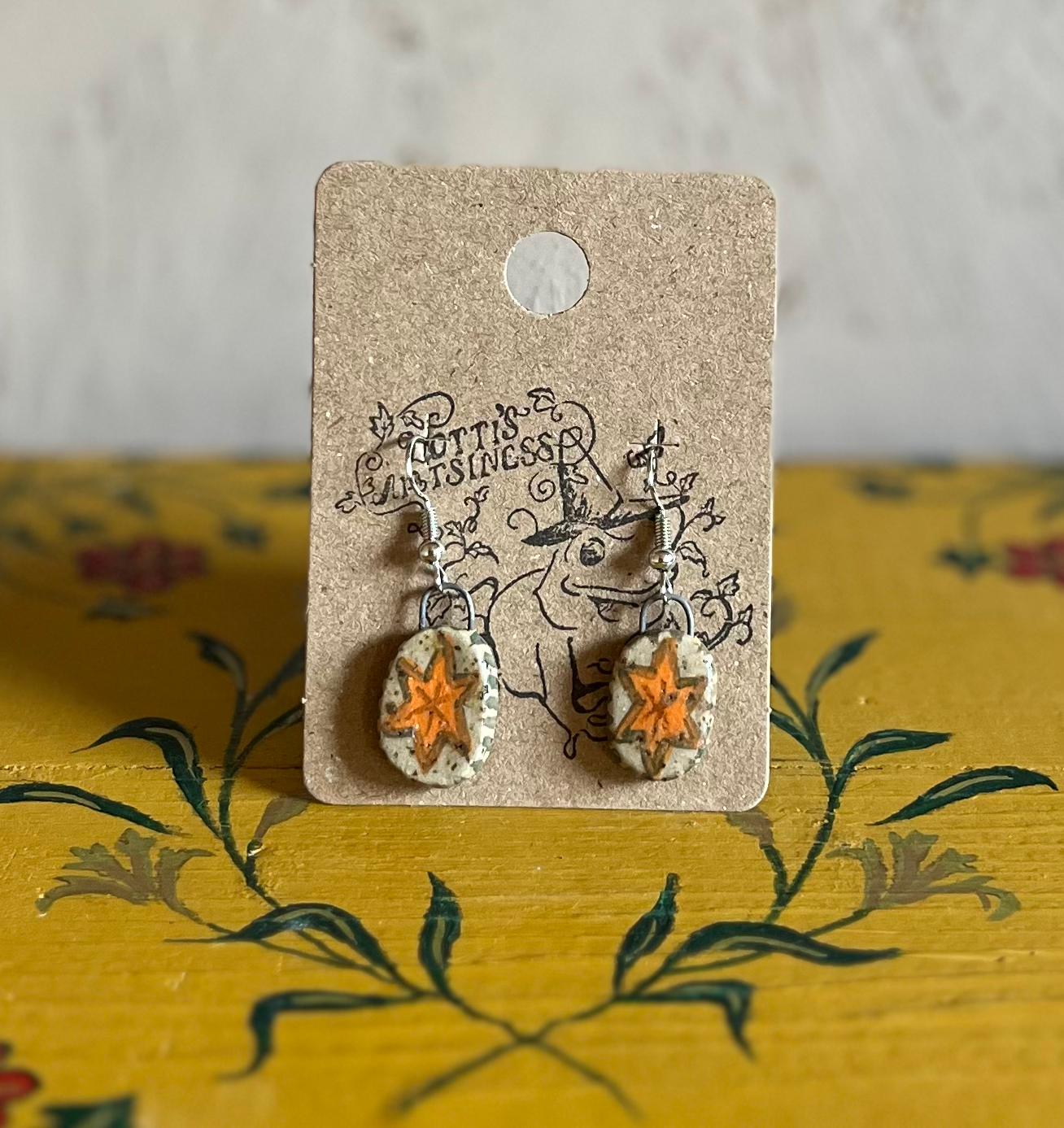 Ceramic orange star earrings 
