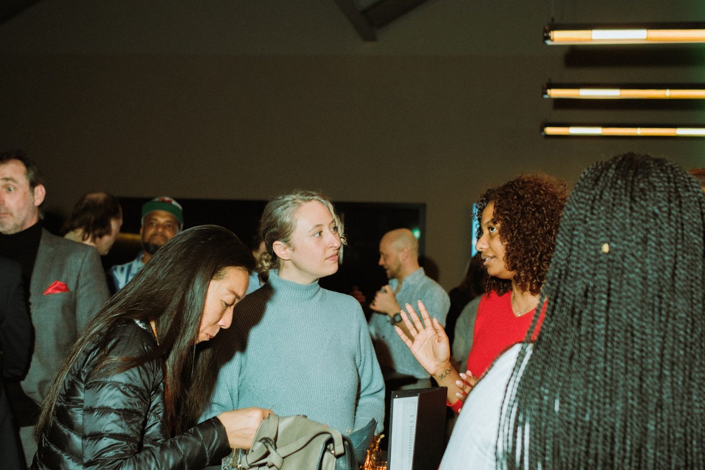 Two women in conversation at an AfroSwissters gathering
