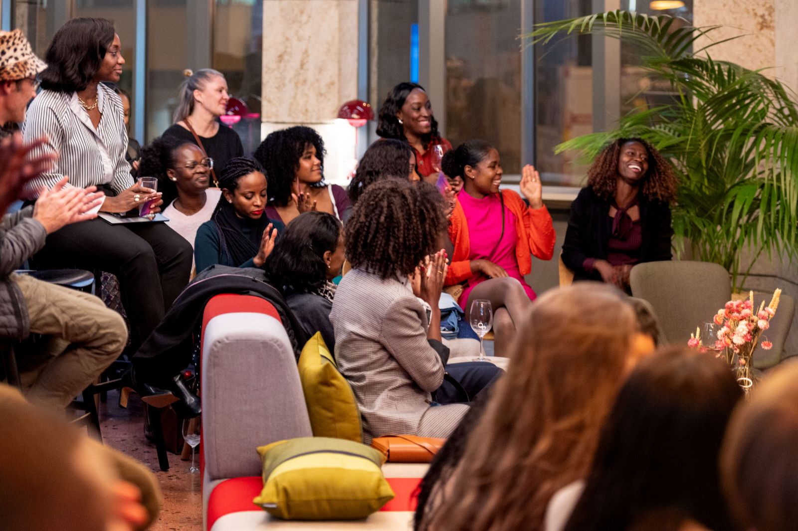 Guests seated in the audience, clapping