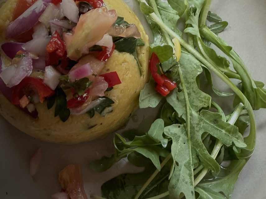 A starter with tomato salsa and rocket
