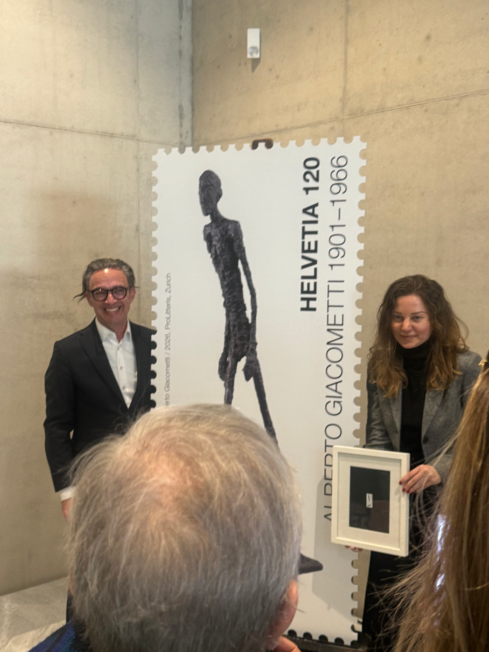 Presentation of the Giacometti commemorative stamp at Kunsthaus Zürich marking the 125th anniversary of Alberto Giacometti, featuring curators, Swiss Post representatives, and cultural leaders.