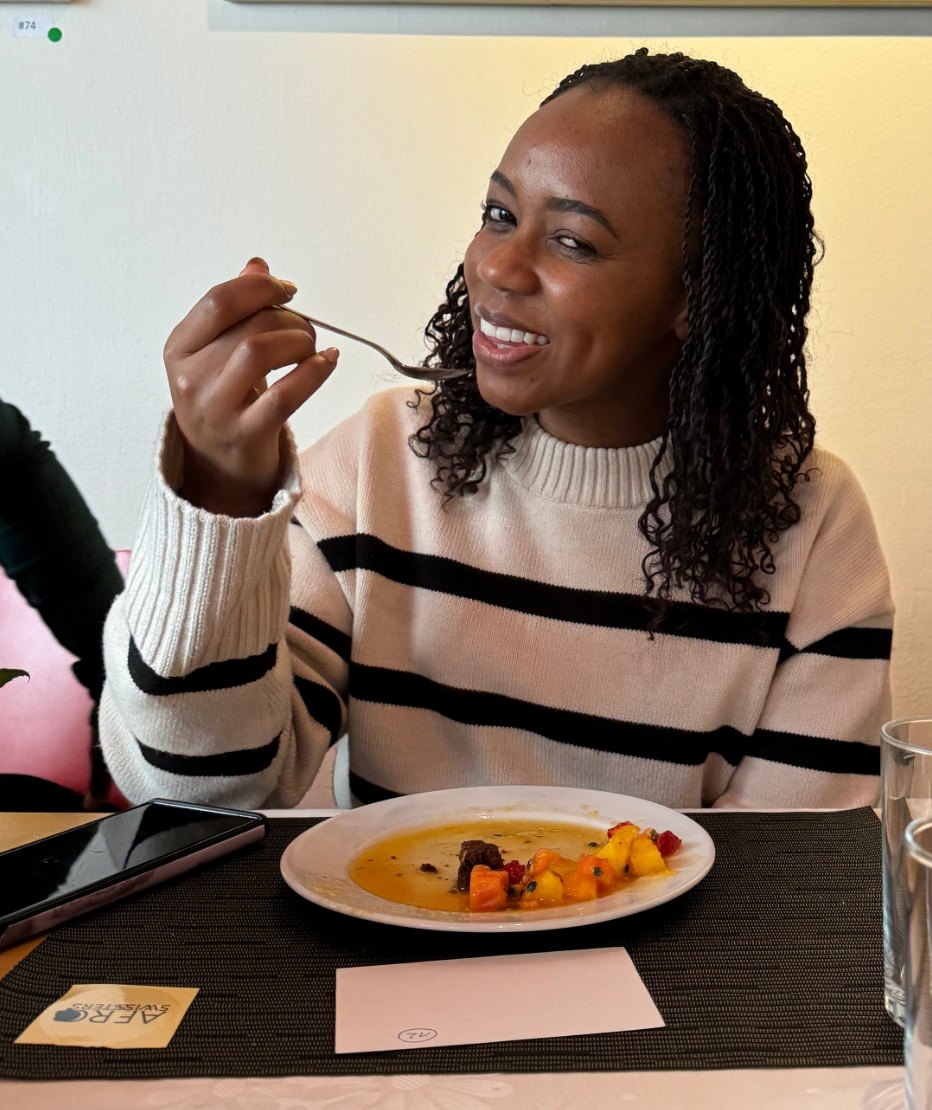 A guest in a striped top at lunch