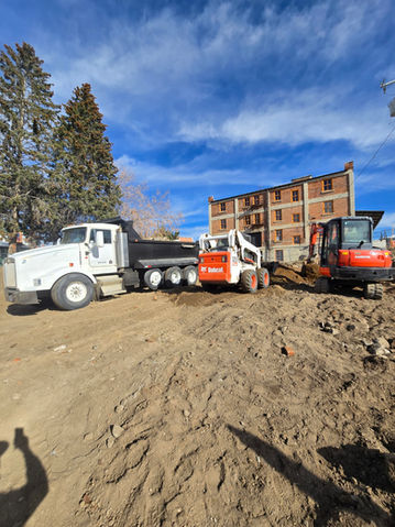 Site prep with equipment.