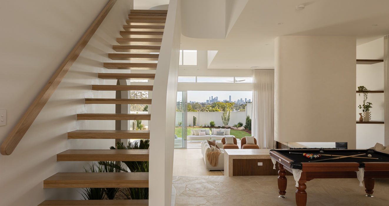 Rumpus room with a pool table and open staircase at Sierra, Sabdia's luxury residential home in Holland Park West, Brisbane.