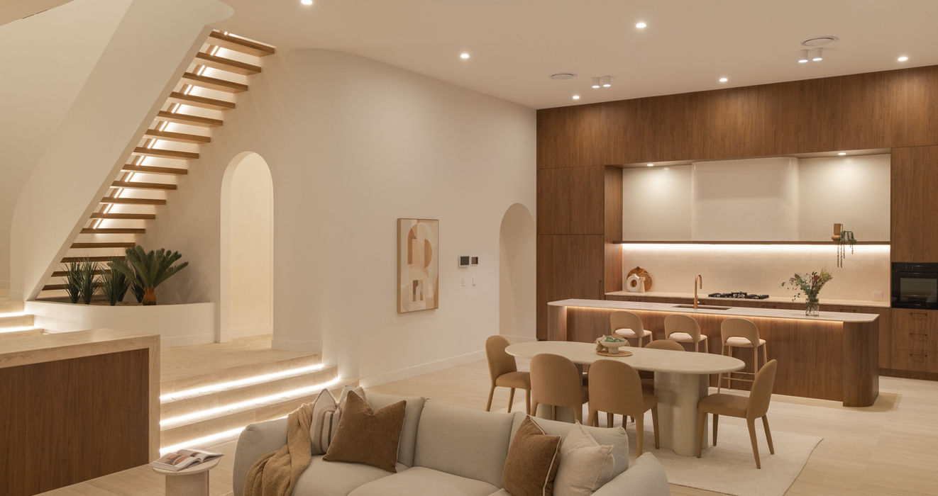 Living room looking to the kitchen and open staircase at Sierra, Sabdia's luxury residential home in Holland Park West, Brisbane.