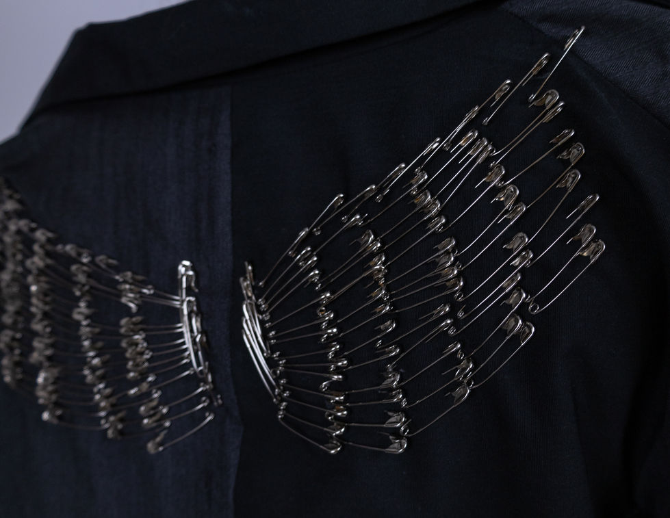 Blazer details, safety pin wings