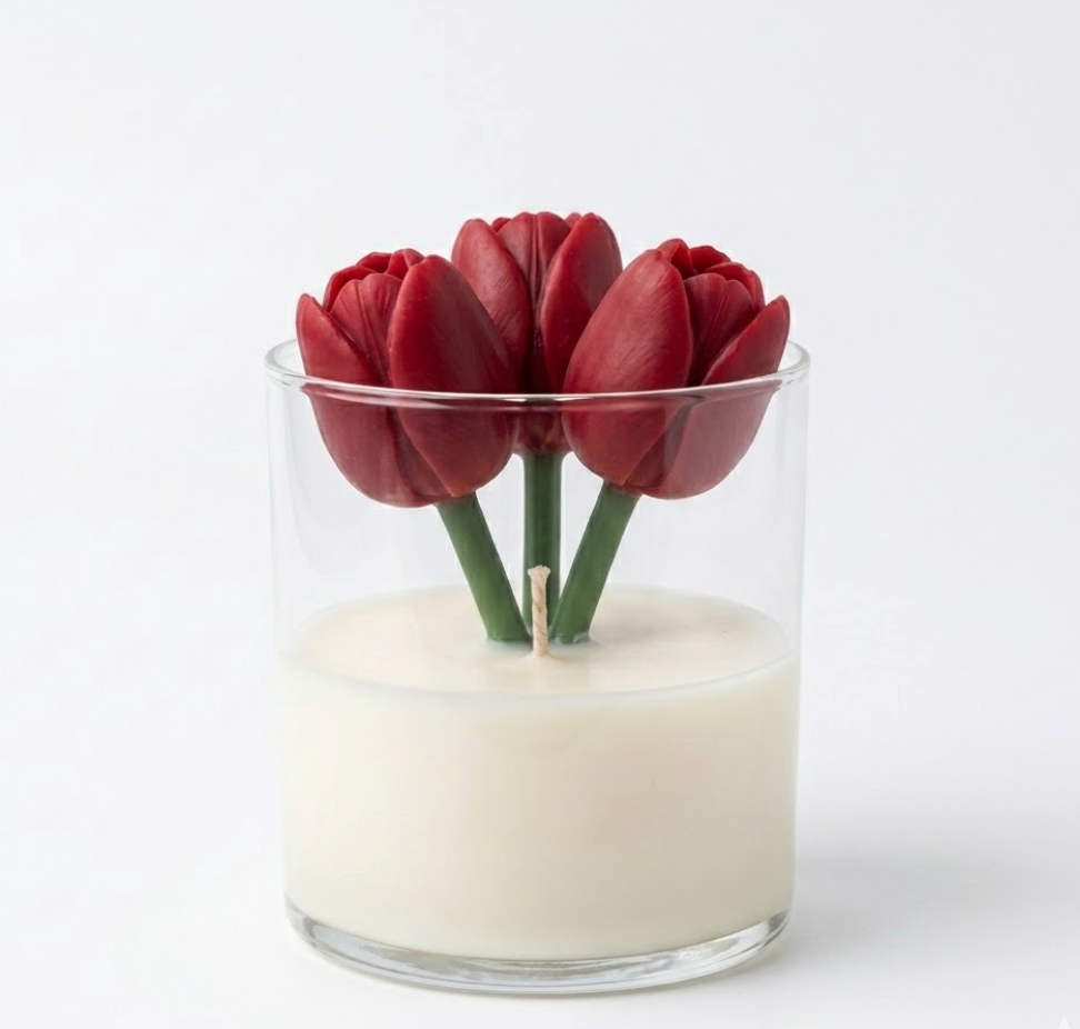 Glass candle with three red tulip wicks