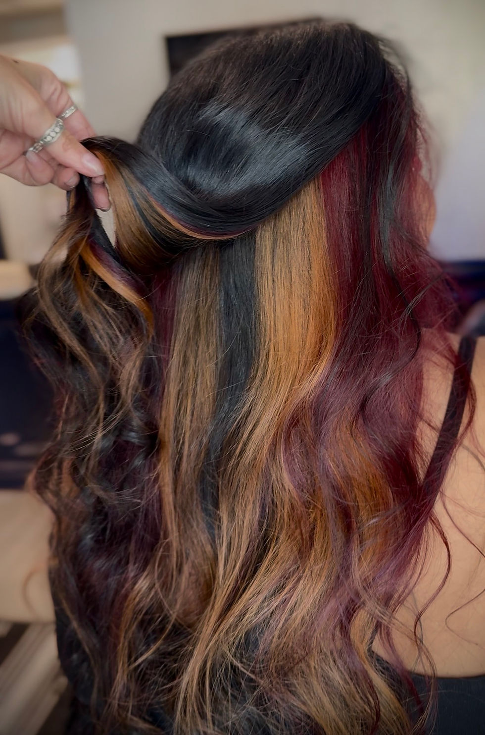 Vibrant fashion hair color with pink purple and blue tones by Fort Myers color specialist