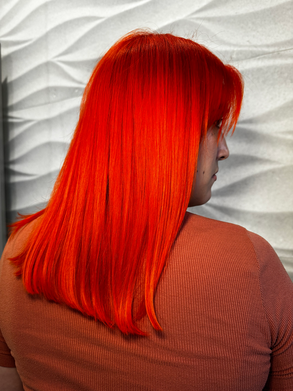 Vibrant fashion hair color with pink purple and blue tones by Fort Myers color specialist