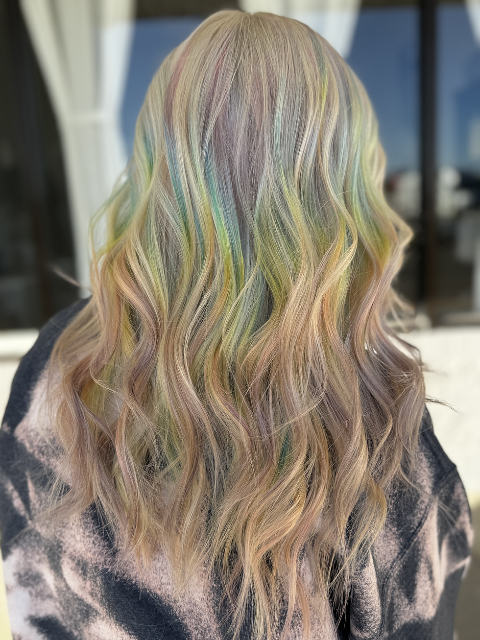Rainbow vivid hair color transformation with bright creative colors in Fort Myers Florida