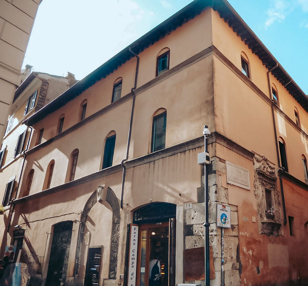 Taverna della Vacca, the ancient entrance is still visible, but now walled up