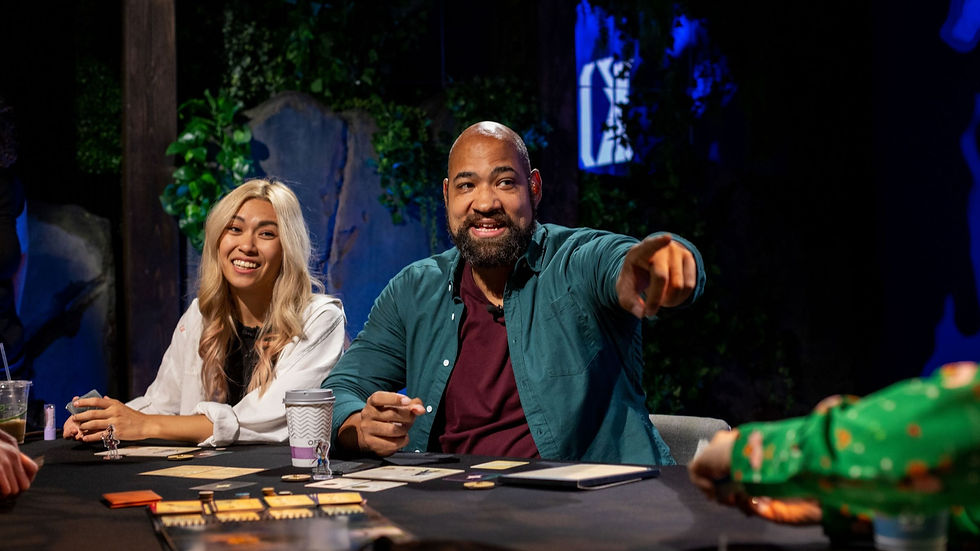 B. Dave Walters pointing at someone while Angeless smiles