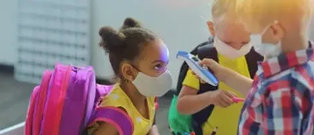 children wearing masks while in class.webp