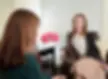 Dr. Chloe talking to another woman one on one.webp