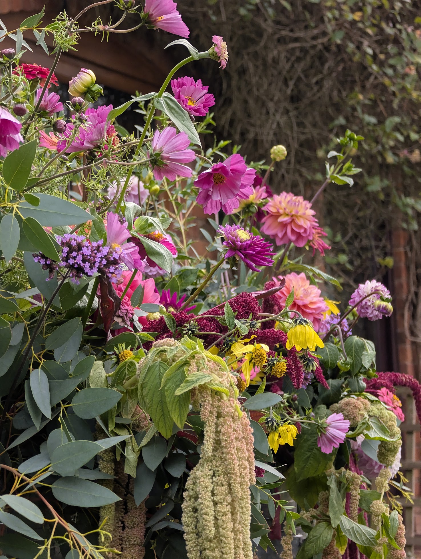 Wedding flowers in milk churn