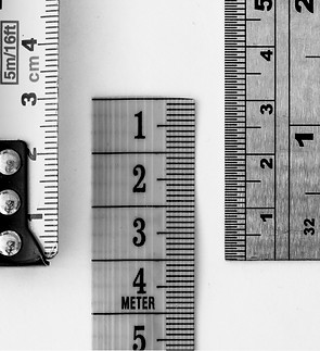 Macro of various tape measures and ruler