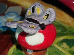 Butterfly on shoe sculpture