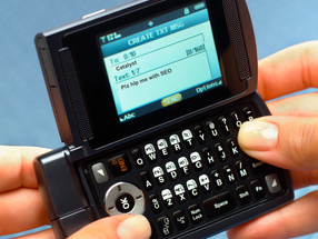 A flip phone with keyboard from the 2000s