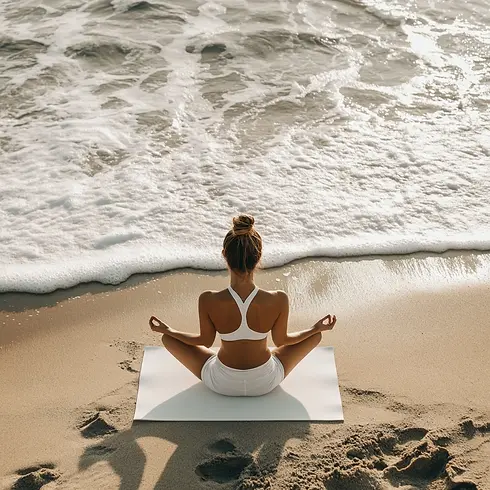 jess_89266_a_person_meditating_from_the_back_on_a_white_yoga_ma_a780f4a8-70e3-46c8-9295-1d