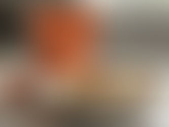 Bowl of oatmeal with bananas and Maple syrup dripping over it